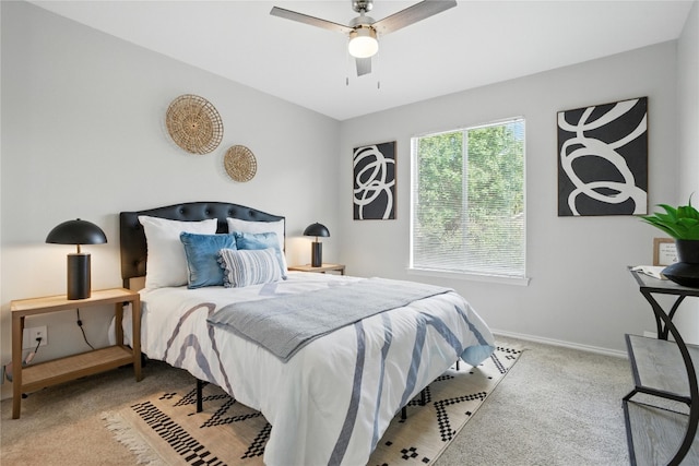 12007 Sky W Dr, Austin, TX 78758 - carpeted bedroom featuring baseboards and a ceiling fan