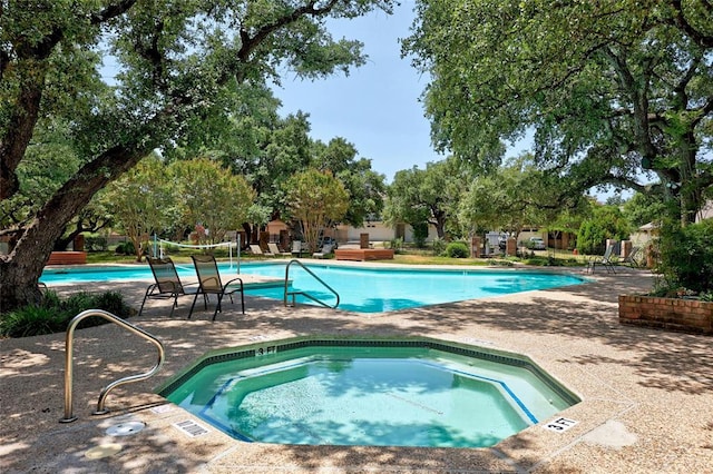 12007 Sky W Dr, Austin, TX 78758 - community pool with a community hot tub and a patio area