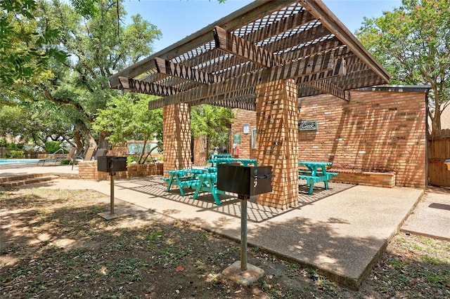 12007 Sky W Dr, Austin, TX 78758 - view of patio / terrace featuring a pergola and outdoor dining area