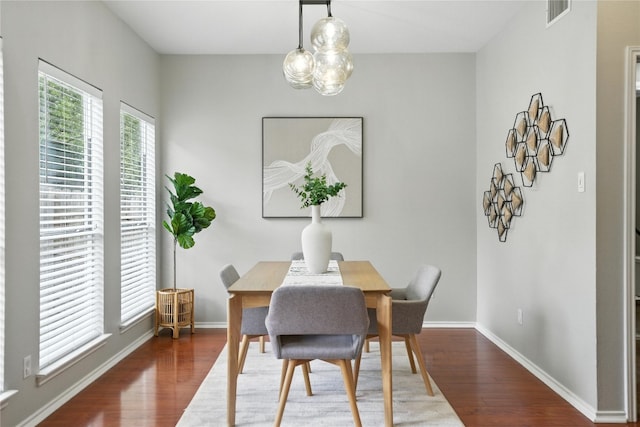 12007 Sky W Dr, Austin, TX 78758 - dining area featuring wood finished floors and baseboards