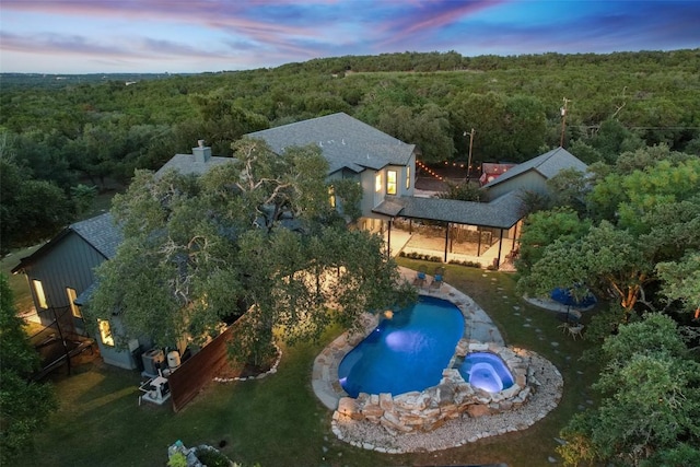 11420 Rim Rock Trl, Austin, TX 78737 - aerial view of property and surrounding area featuring a heavily wooded area and a pool area