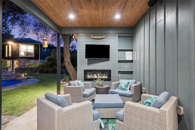 11420 Rim Rock Trl, Austin, TX 78737 - view of patio / terrace featuring an outdoor living space with a fireplace