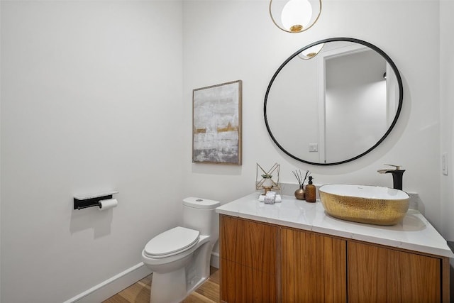 11420 Rim Rock Trl, Austin, TX 78737 - half bathroom with vanity and wood finished floors