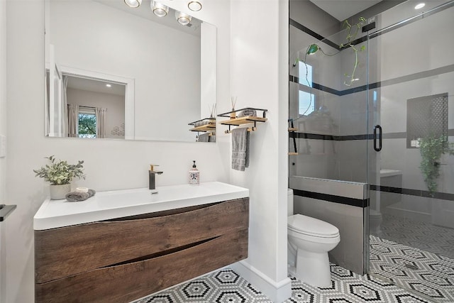 11420 Rim Rock Trl, Austin, TX 78737 - full bathroom featuring vanity, a stall shower, and tile patterned floors