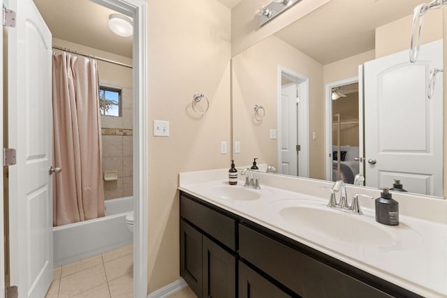 12417 Mediterra Pl, Austin, TX 78732 - full bathroom with double vanity, shower / bath combo with shower curtain, and tile patterned flooring