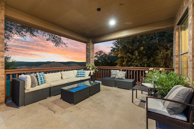 12417 Mediterra Pl, Austin, TX 78732 - patio terrace at dusk featuring outdoor lounge area and a patio