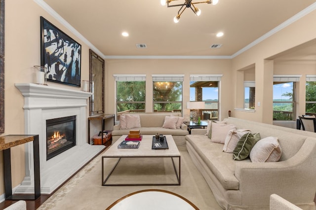 12417 Mediterra Pl, Austin, TX 78732 - living area with a glass covered fireplace, crown molding, recessed lighting, wood finished floors, and a chandelier