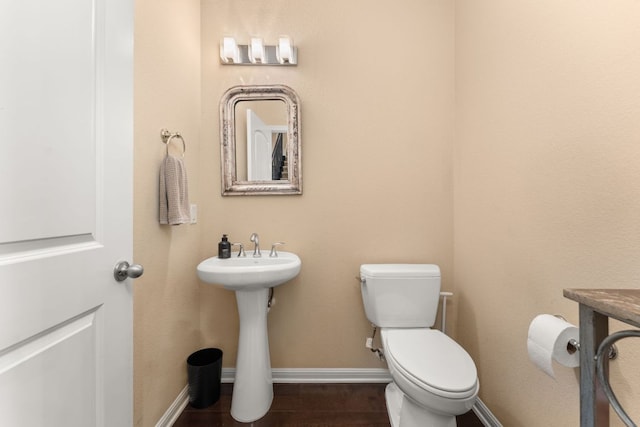 12417 Mediterra Pl, Austin, TX 78732 - half bathroom with baseboards and toilet