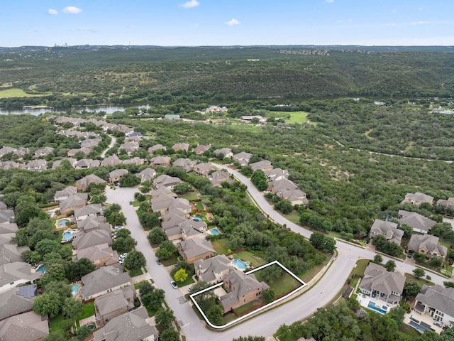 12417 Mediterra Pl, Austin, TX 78732 - aerial view of residential area featuring property parcel outlined and a large body of water