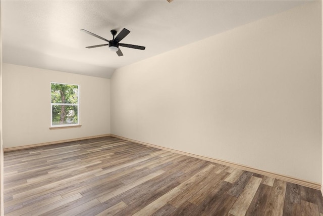 417 S Blanco St, Lockhart, TX 78644 - unfurnished room featuring wood finished floors and a ceiling fan