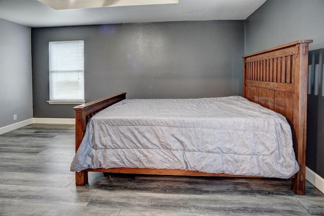742 Annika Way, Bastrop, TX 78602 - bedroom with wood finished floors and baseboards