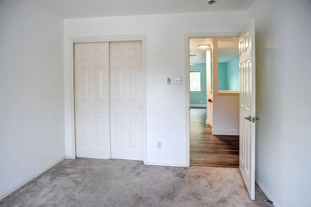 742 Annika Way, Bastrop, TX 78602 - unfurnished bedroom featuring a closet and carpet floors