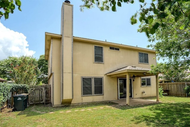 742 Annika Way, Bastrop, TX 78602 - rear view of property featuring a patio, a fenced backyard, and a chimney