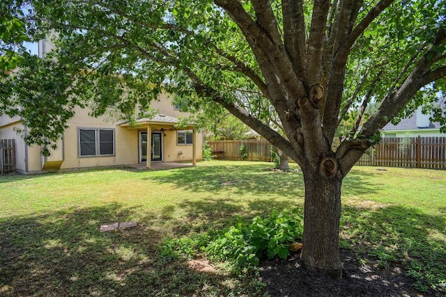742 Annika Way, Bastrop, TX 78602 - fenced backyard featuring french doors