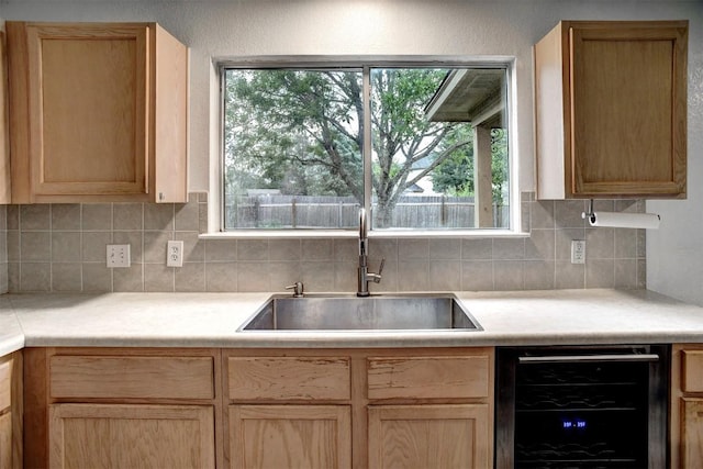 742 Annika Way, Bastrop, TX 78602 - kitchen featuring wine cooler, tasteful backsplash, light brown cabinets, light countertops, and plenty of natural light