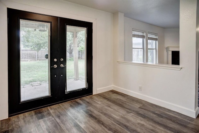 742 Annika Way, Bastrop, TX 78602 - foyer entrance with wood finished floors and french doors