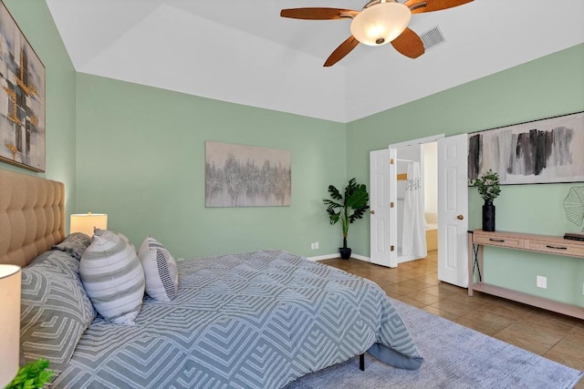207 Golf Crest Ln, Lakeway, TX 78734 - bedroom with tile patterned floors, a ceiling fan, and high vaulted ceiling
