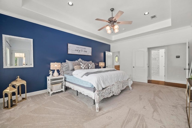 9 Heatherbloom Ln, The Hills, TX 78738 - carpeted bedroom with a tray ceiling, recessed lighting, ceiling fan, and ornamental molding