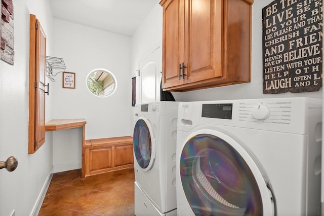 9 Heatherbloom Ln, The Hills, TX 78738 - laundry area featuring washing machine and clothes dryer, cabinet space, and tile patterned flooring