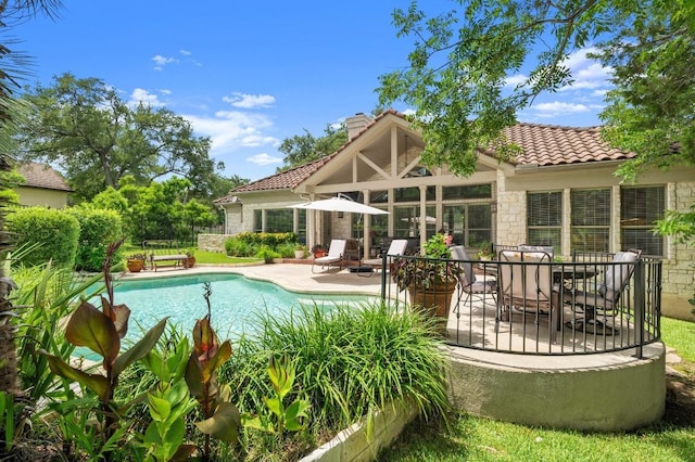 9 Heatherbloom Ln, The Hills, TX 78738 - swimming pool featuring a patio area