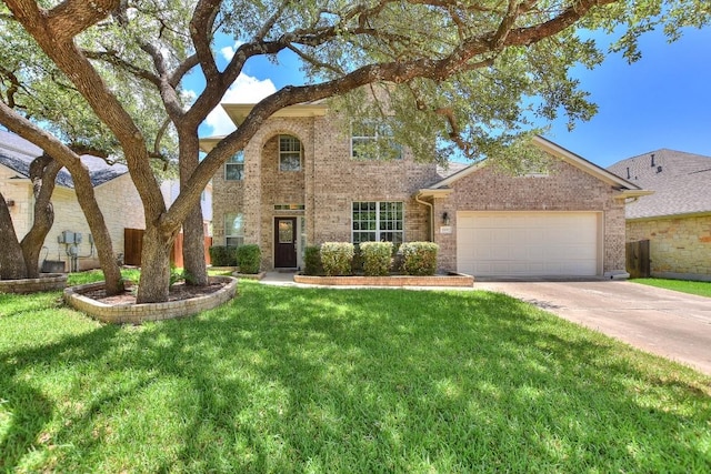 1108 Ritter Dr, Cedar Park, TX 78613 - traditional-style house featuring brick siding, concrete driveway, an attached garage, and a front yard