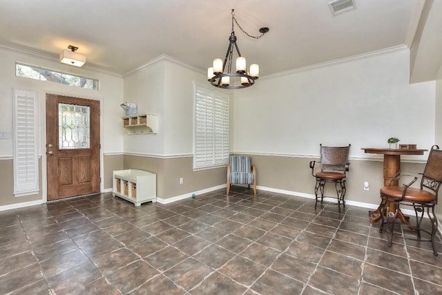 1108 Ritter Dr, Cedar Park, TX 78613 - foyer entrance featuring a chandelier, ornamental molding, and tile patterned flooring