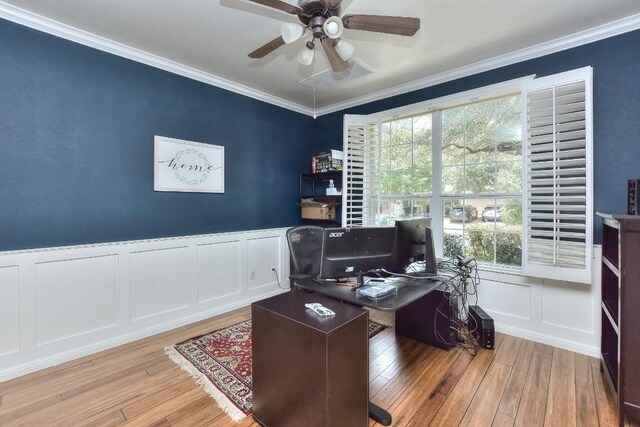 1108 Ritter Dr, Cedar Park, TX 78613 - office area featuring a decorative wall, wood finished floors, a ceiling fan, ornamental molding, and wainscoting