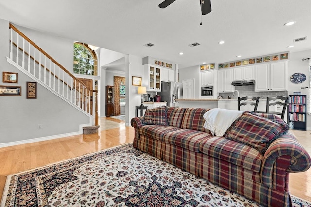 7900 Monona Ave, Austin, TX 78717 - living area with light wood-style floors, stairway, a ceiling fan, and recessed lighting