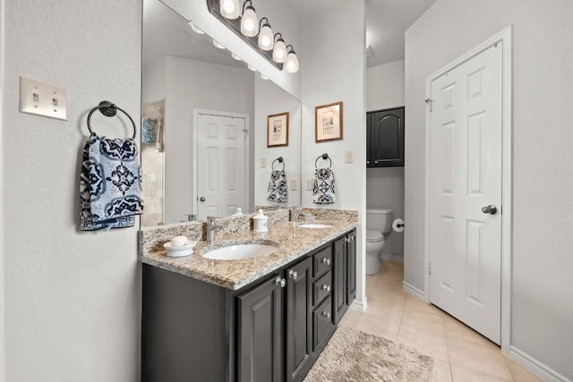 7900 Monona Ave, Austin, TX 78717 - bathroom featuring double vanity and tile patterned flooring