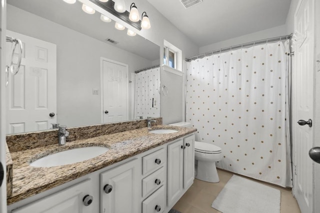 7900 Monona Ave, Austin, TX 78717 - bathroom featuring double vanity, tile patterned flooring, and a shower with shower curtain
