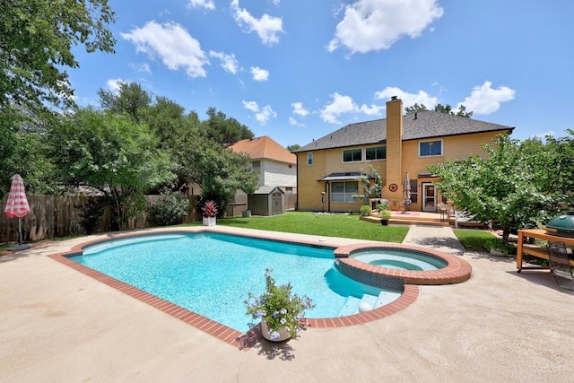 7900 Monona Ave, Austin, TX 78717 - view of swimming pool featuring a shed, a pool with connected hot tub, and a patio