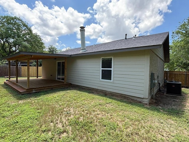 4608 E Village Ct, Austin, TX 78744 - back of property with a deck and roof with shingles