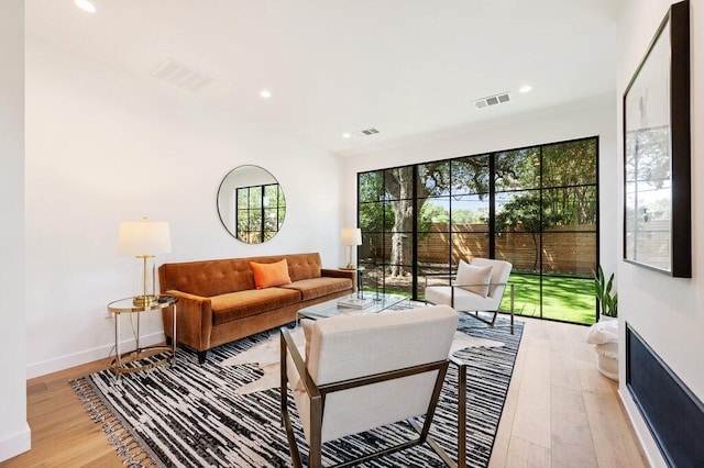 2517 Great Oaks Pkwy, Austin, TX 78756 - living area with wood finished floors and recessed lighting