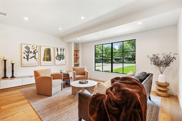 2517 Great Oaks Pkwy, Austin, TX 78756 - living room featuring light wood-style floors and recessed lighting