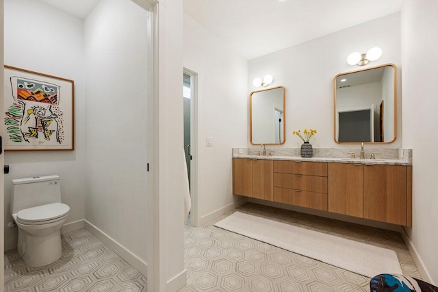 2517 Great Oaks Pkwy, Austin, TX 78756 - bathroom with double vanity and tile patterned floors