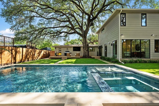 2517 Great Oaks Pkwy, Austin, TX 78756 - view of swimming pool featuring a fenced backyard, a pool with connected hot tub, a wooden deck, and an outdoor hangout area