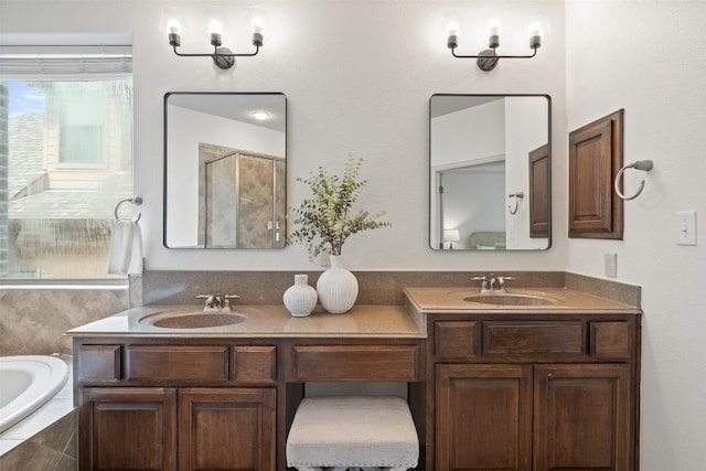 3803 Katie Ln, Cedar Park, TX 78613 - bathroom featuring double vanity, a garden tub, and a shower