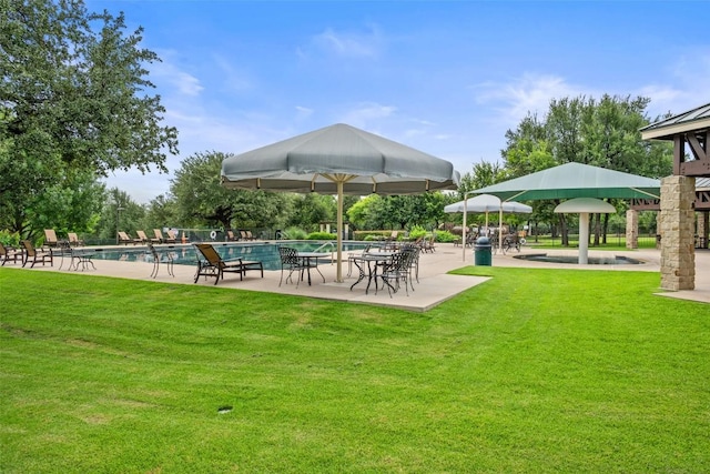 3803 Katie Ln, Cedar Park, TX 78613 - view of property's community with a swimming pool, a lawn, a gazebo, and a patio area