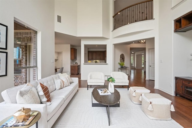 3803 Katie Ln, Cedar Park, TX 78613 - living room featuring wood finished floors and a towering ceiling