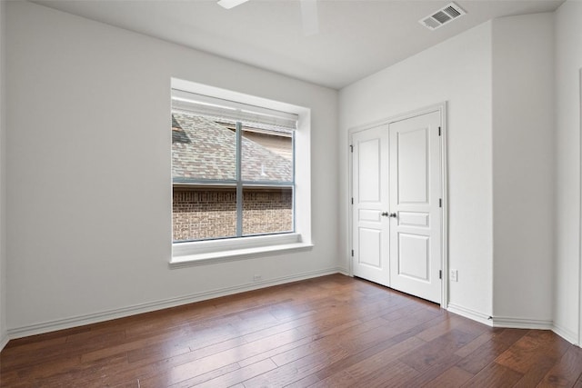 3803 Katie Ln, Cedar Park, TX 78613 - unfurnished bedroom with wood-type flooring, a closet, and a ceiling fan