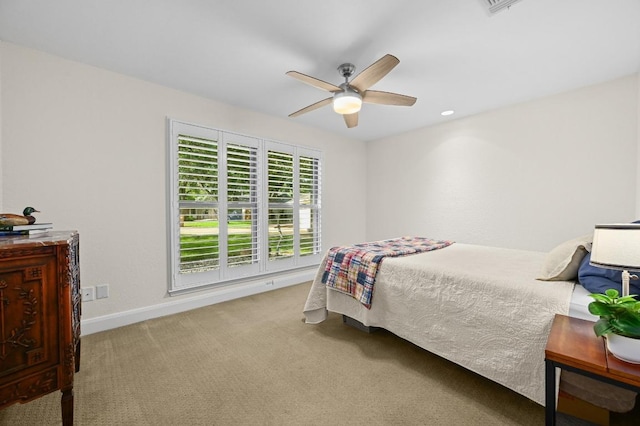 2400 Muirfield Cir, Austin, TX 78747 - carpeted bedroom with baseboards and a ceiling fan