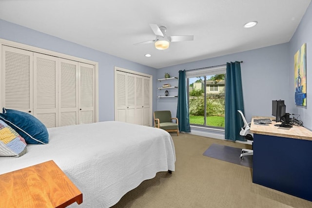 2400 Muirfield Cir, Austin, TX 78747 - bedroom featuring a desk, two closets, carpet flooring, a ceiling fan, and recessed lighting