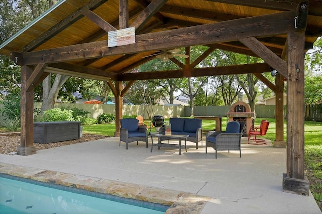 2400 Muirfield Cir, Austin, TX 78747 - view of swimming pool with a gazebo, an outdoor hangout area, a fenced backyard, and a patio