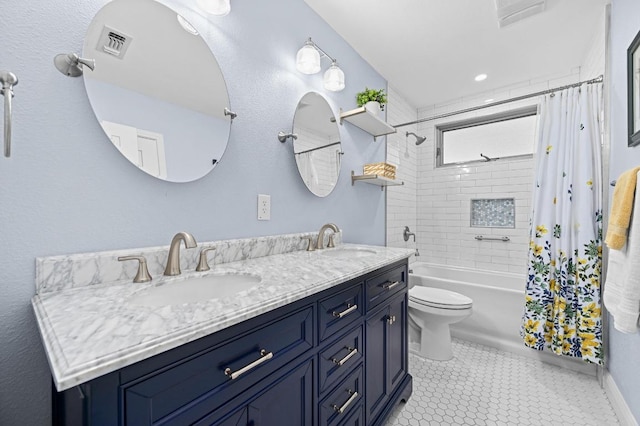 2400 Muirfield Cir, Austin, TX 78747 - full bath featuring double vanity and shower / bath combo with shower curtain