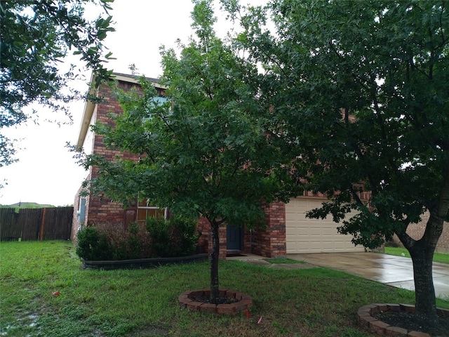 11540 Arbroath Ln, Austin, TX 78754 - view of front of home with concrete driveway and an attached garage