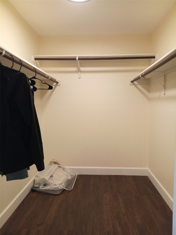 11540 Arbroath Ln, Austin, TX 78754 - walk in closet featuring wood finished floors