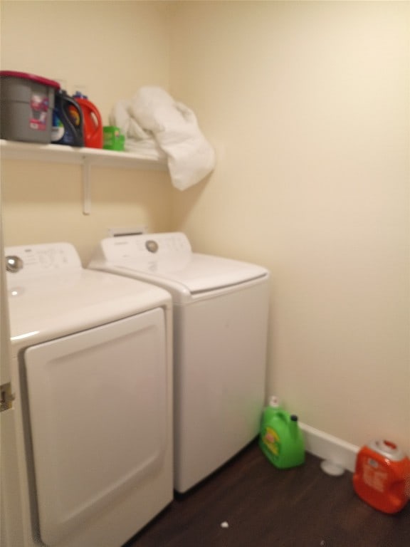 11540 Arbroath Ln, Austin, TX 78754 - washroom with separate washer and dryer and wood finished floors