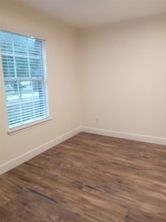 11540 Arbroath Ln, Austin, TX 78754 - empty room with baseboards and wood finished floors