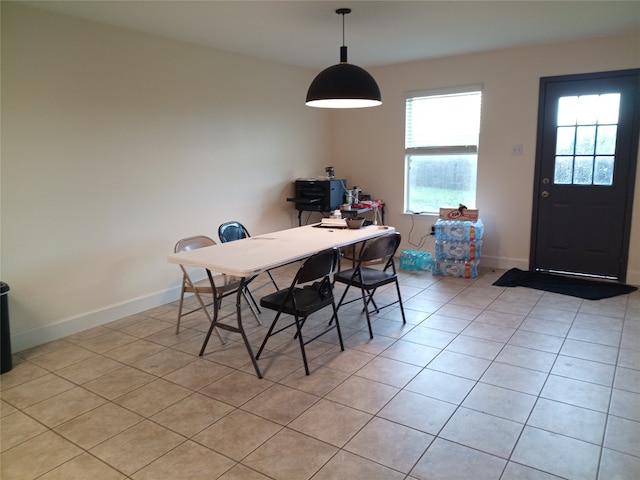 11540 Arbroath Ln, Austin, TX 78754 - dining space with light tile patterned floors and an office area