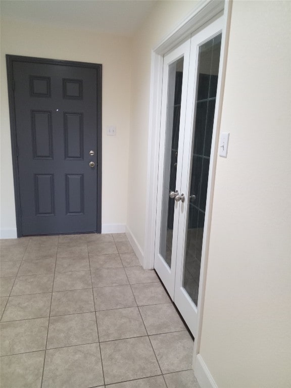 11540 Arbroath Ln, Austin, TX 78754 - view of exterior entry featuring french doors and stucco siding